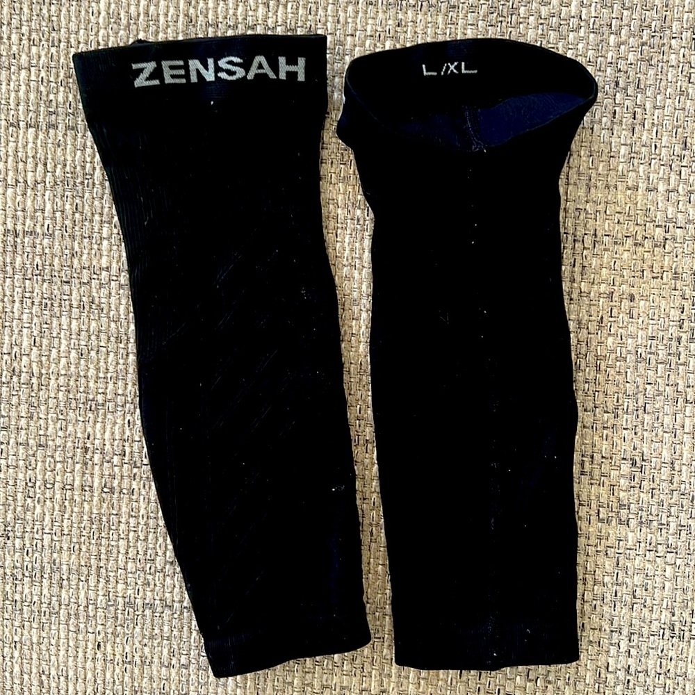 One pair of Zensah black compression sleeves sz L/XL
